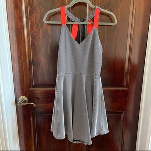 Material Girl black/white stripe dress with cutout back with neon strapping. L